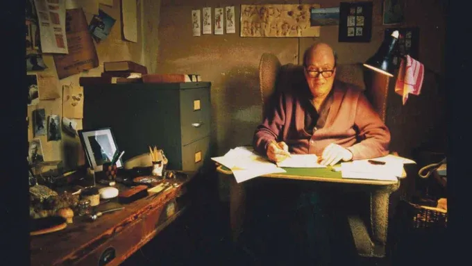 Roald Dahl at work in his garden shed