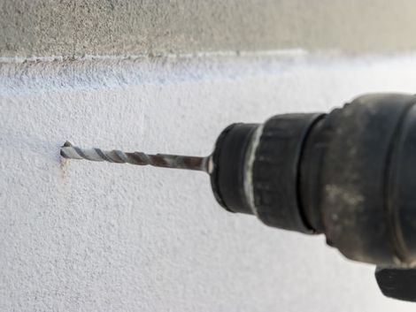 Drilling with an impact drill