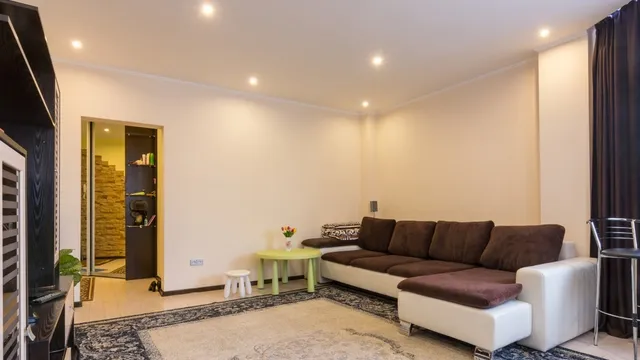 living room with ceiling spotlights