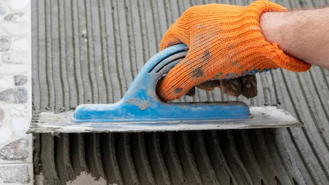 man uses trowel