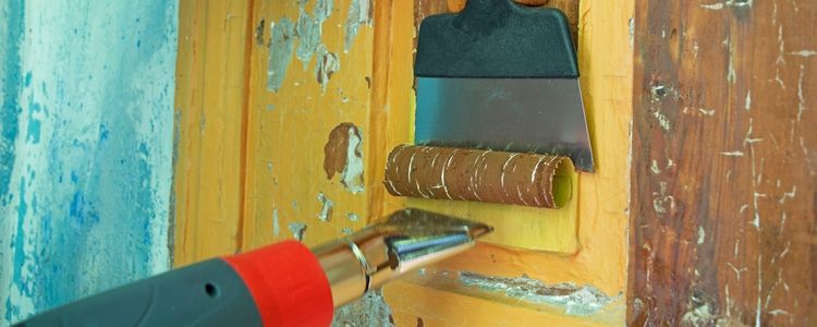 How do you remove paint from wood?